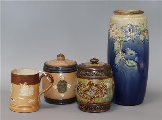 A Doulton vase, two tobacco jars and a stoneware mug tallest 25cm